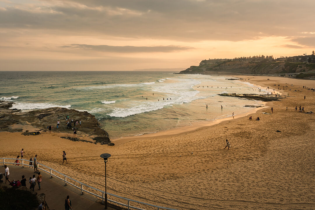 Beach bay with people relaxing